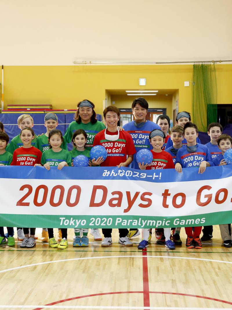 Children at the Tokyo International School celebrate 2000 days before Tokyo 2020 Paralympic Games