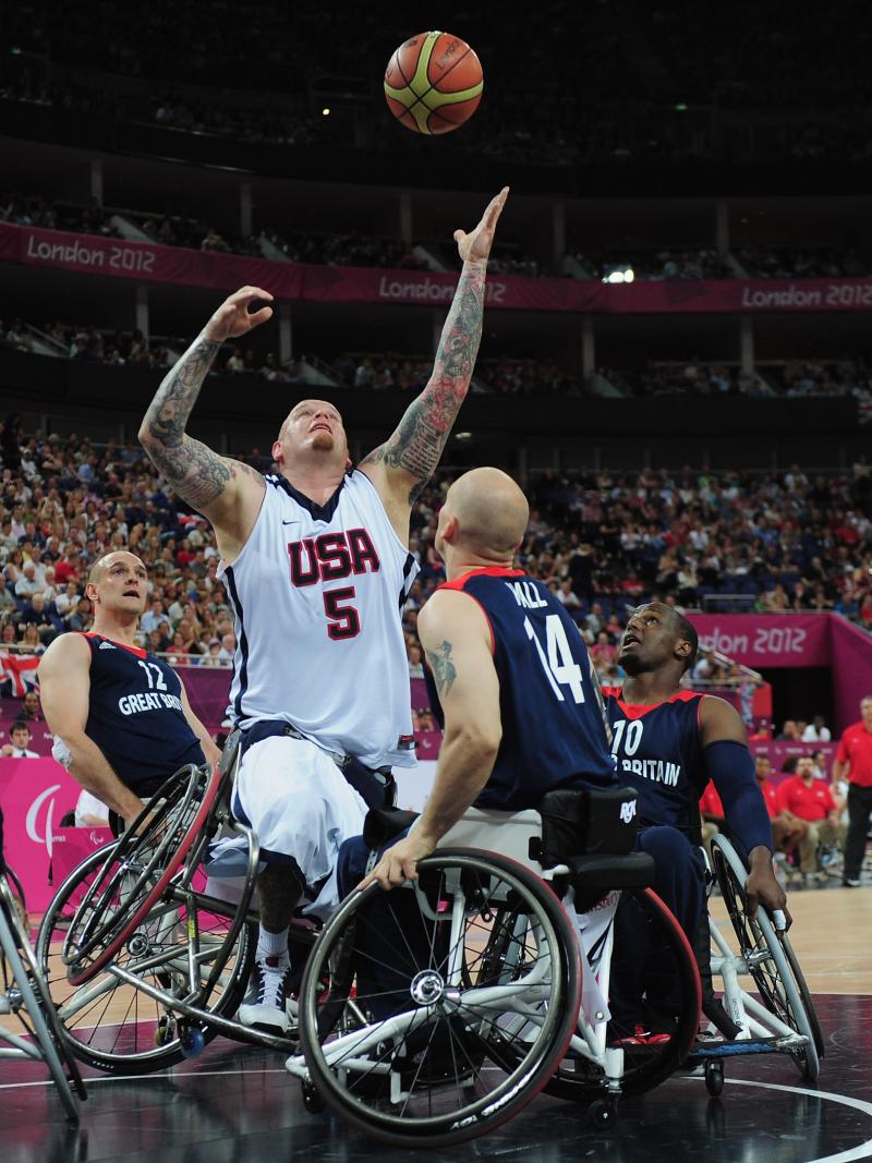 Joseph Chambers of United States reaches for the ball during the bronze medal Wheelchair Basketball match between United States and Great Britain at the London 2012 Paralympic Games
