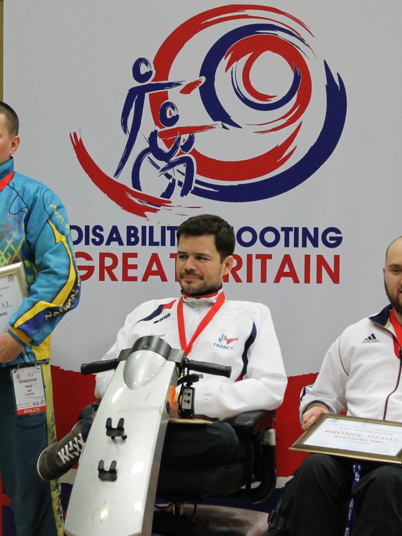 Tanguy De La Forest, Vasyl Kovalchuk and Ryan Cockbill at the 2015 IPC Shooting World Cup in Stoke Mandeville, Great Britain