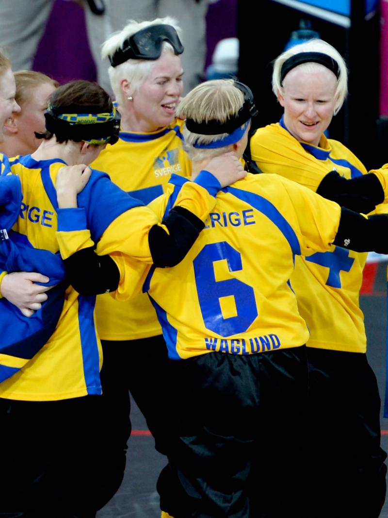 The team of Sweden celebrates after winning their Women's Team Goalball Bronze Medal match against Finland at the London 2012 Paralympic Games.