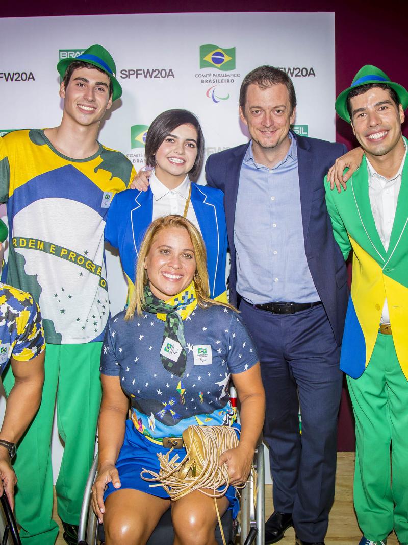 Andrew Parsons, President of the Brazilian Paralympic Committee with Brazilian athletes at the Sao Paulo Fashion Week
