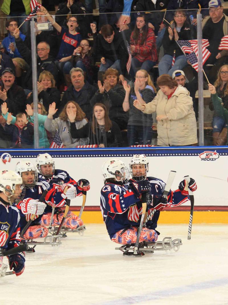 Paul Schaus, Josh Sweeney, Josh Pauls, Nikko Landeros, Luke McDermott compete at the 2015 IPC Ice Sledge Hockey World Championships A-Pool in Buffalo, USA.