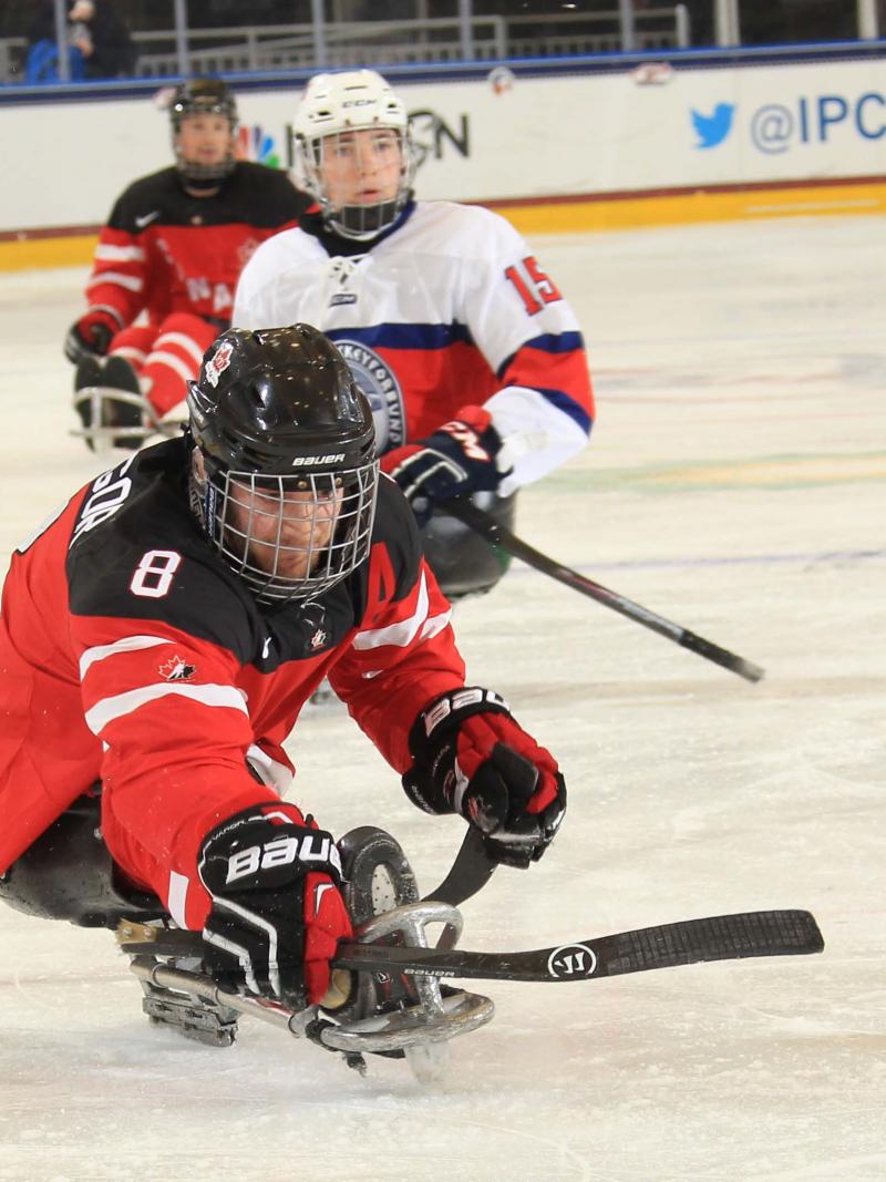 Tyler McGregor races after the puck in Canada's preliminary round game against Norway at Buffalo 2015.