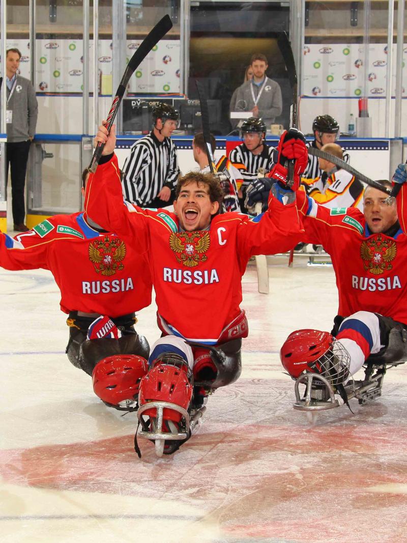 Russian captain Dmitrii Lisov celebrates with his teammates after defeating Germany at Buffalo 2015.