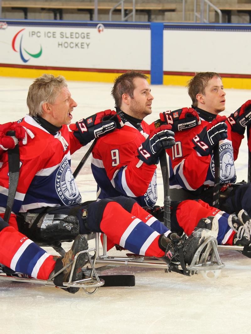 Norway's team listens to their national anthem after defeating Japan in their final prelminary round game at Buffalo 2015.