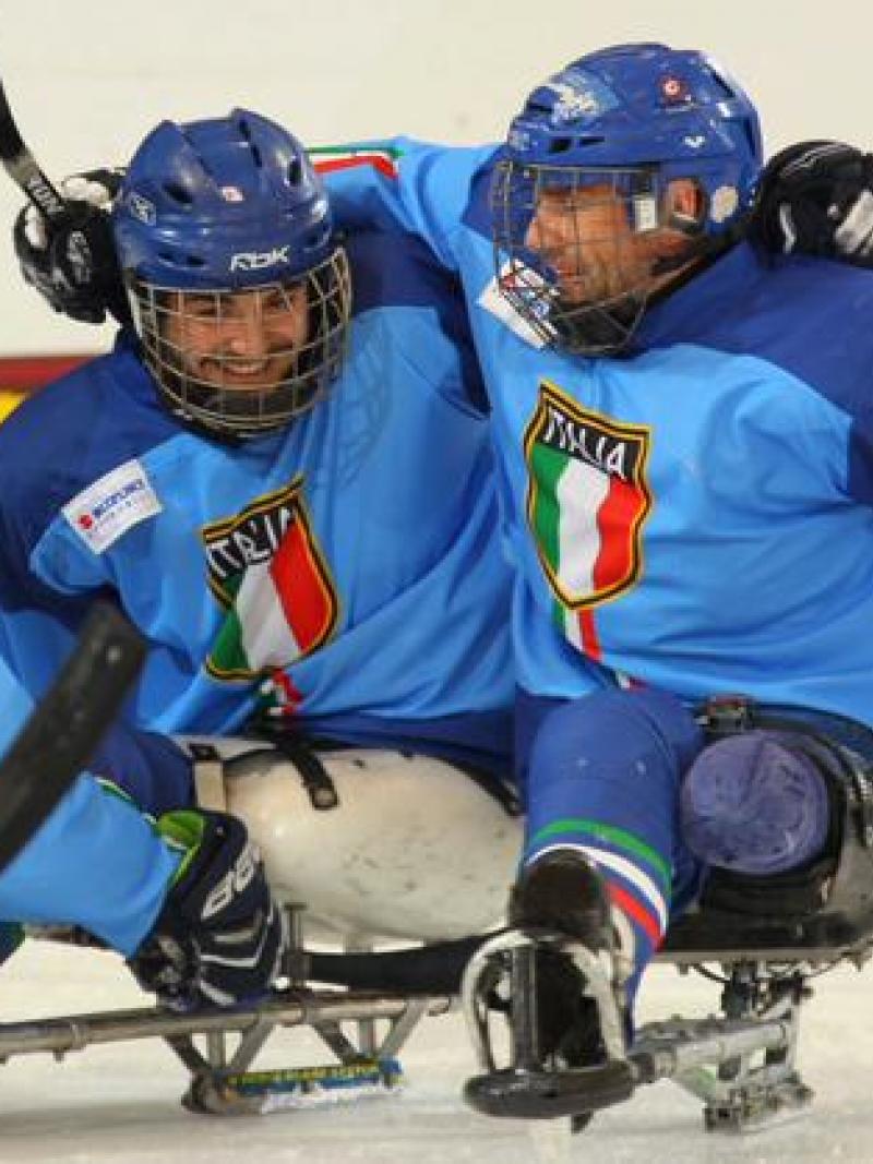 Italy's players celebrate after winning their playoff game at Buffalo 2015.