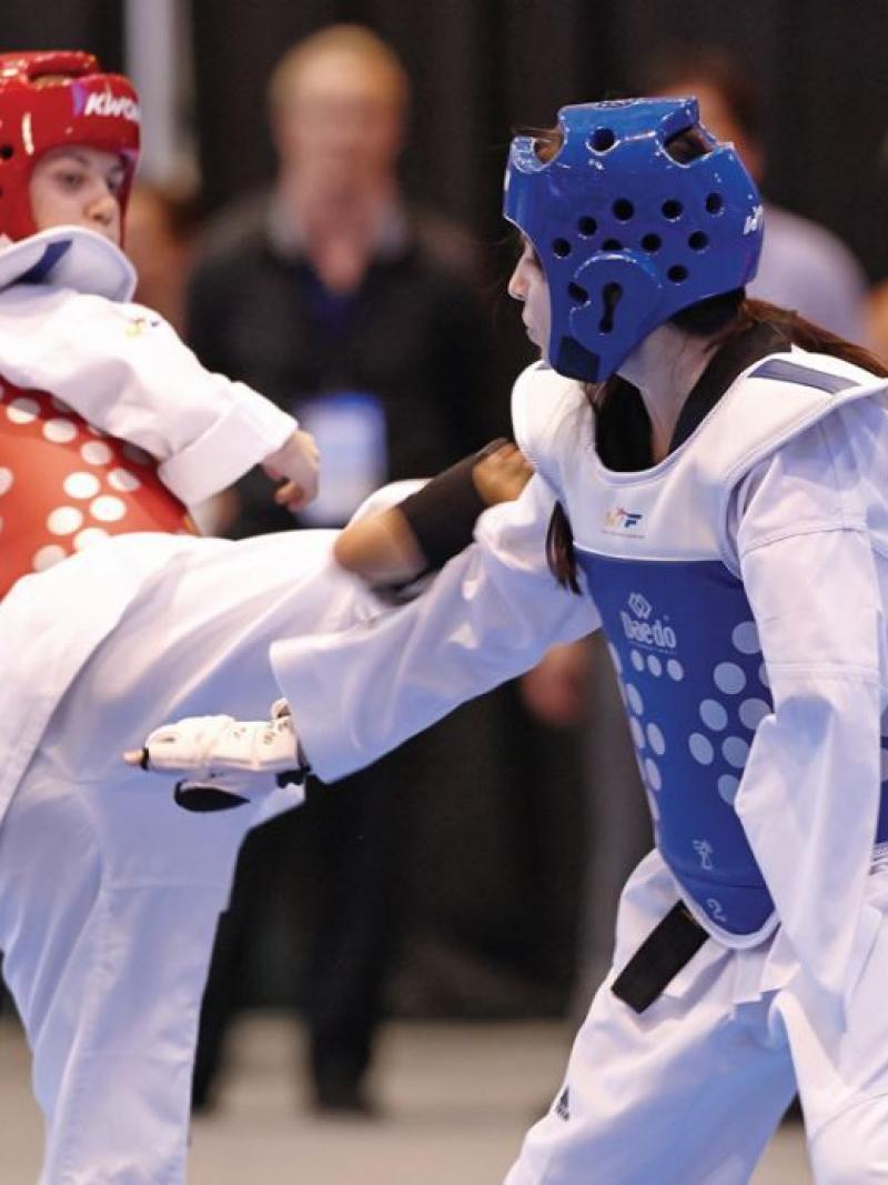 Two athletes doing taekwondo