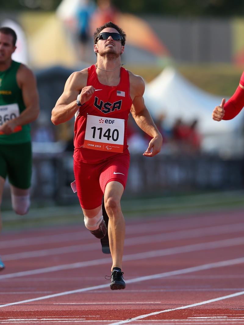 US sprinter Jarryd Wallace wins the men's 200m T44 World Championships race.