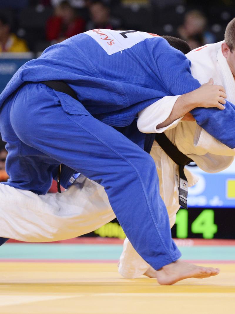 Two judoka competiting. 