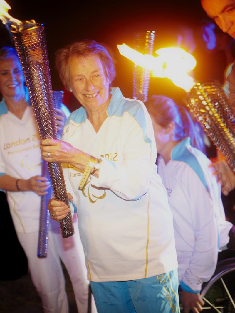 Eva Loeffler, daughter of Sir Ludwig Guttman, taking part in the London 2012 Paralympic Torch Relay.