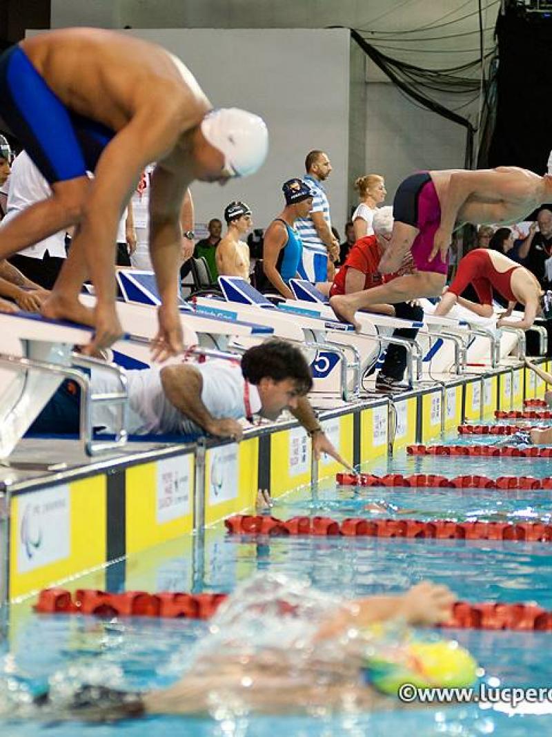 Swimmers begin their race