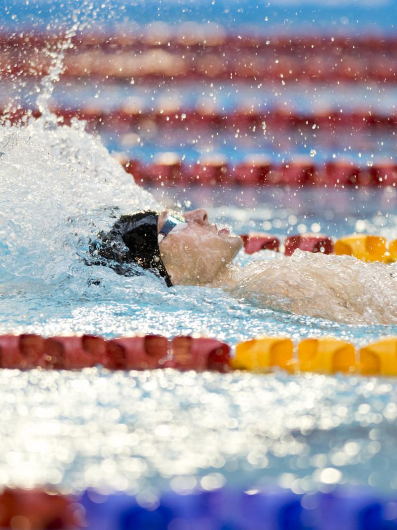 Swimmer doing backstroke