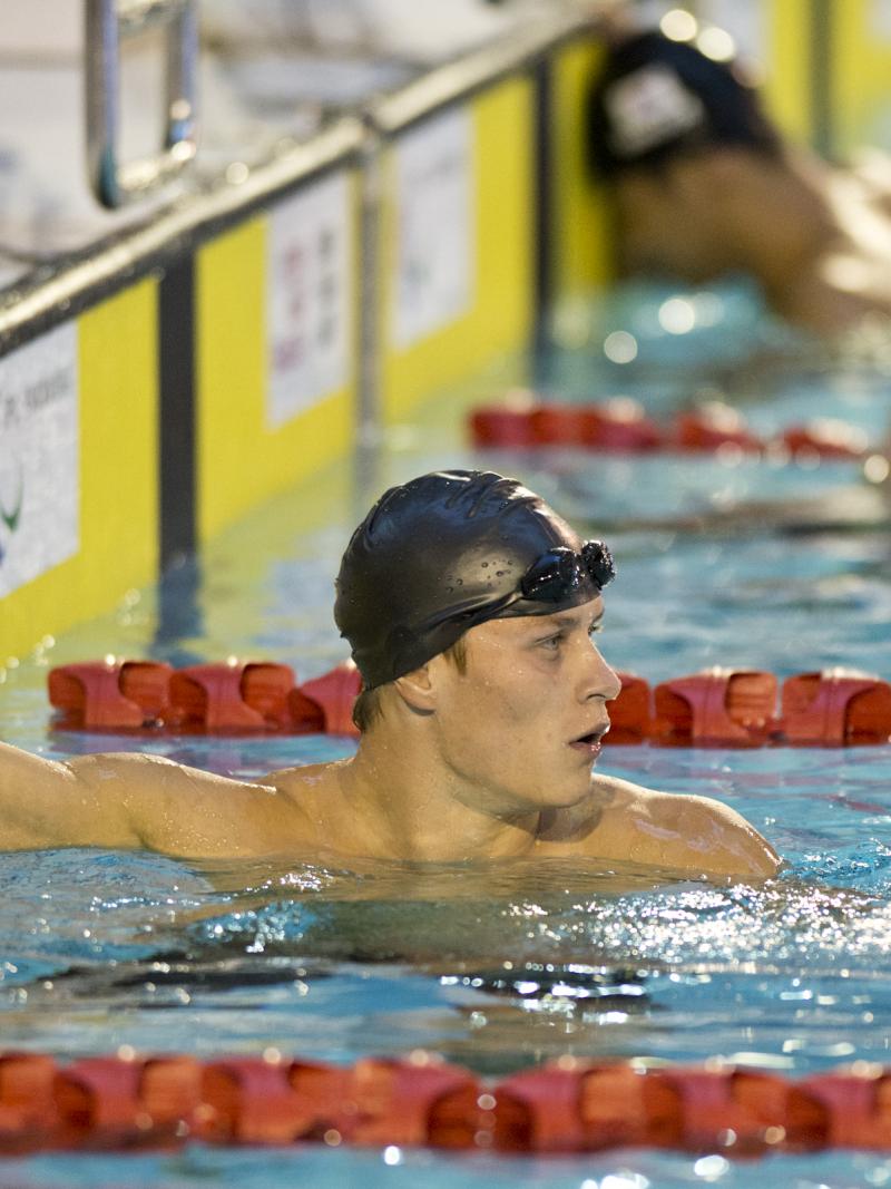 A intellectually impaired swimmer finishes a race