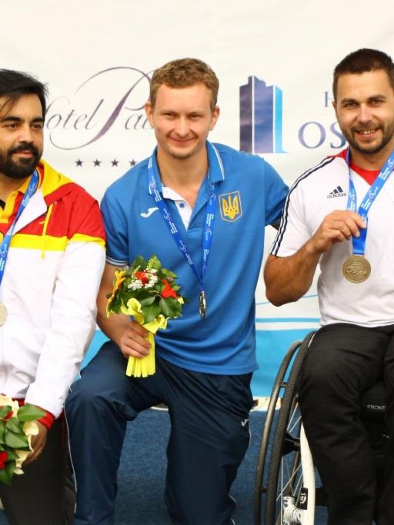 Ukraine’s Andrii Doroshenko wins gold in the R6, beating Spain’s Juan Antonio Saavedra Reinaldo and Great Britain’s Matt Skelhon at the IPC Shooting World Cup on 14 July in Osijek, Croatia.