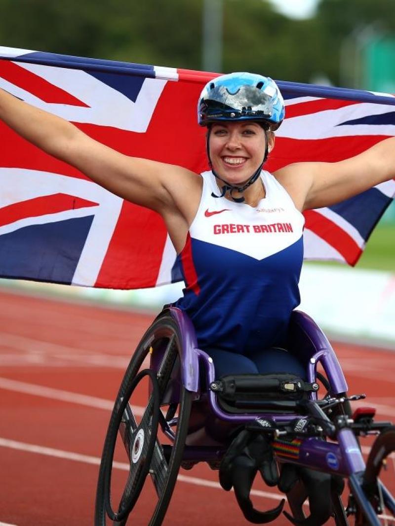 Hannah Cockroft of Great Britain celebrates after winning the womens 800m T34 final during day four of the IPC Athletics European Championships in Swansea.