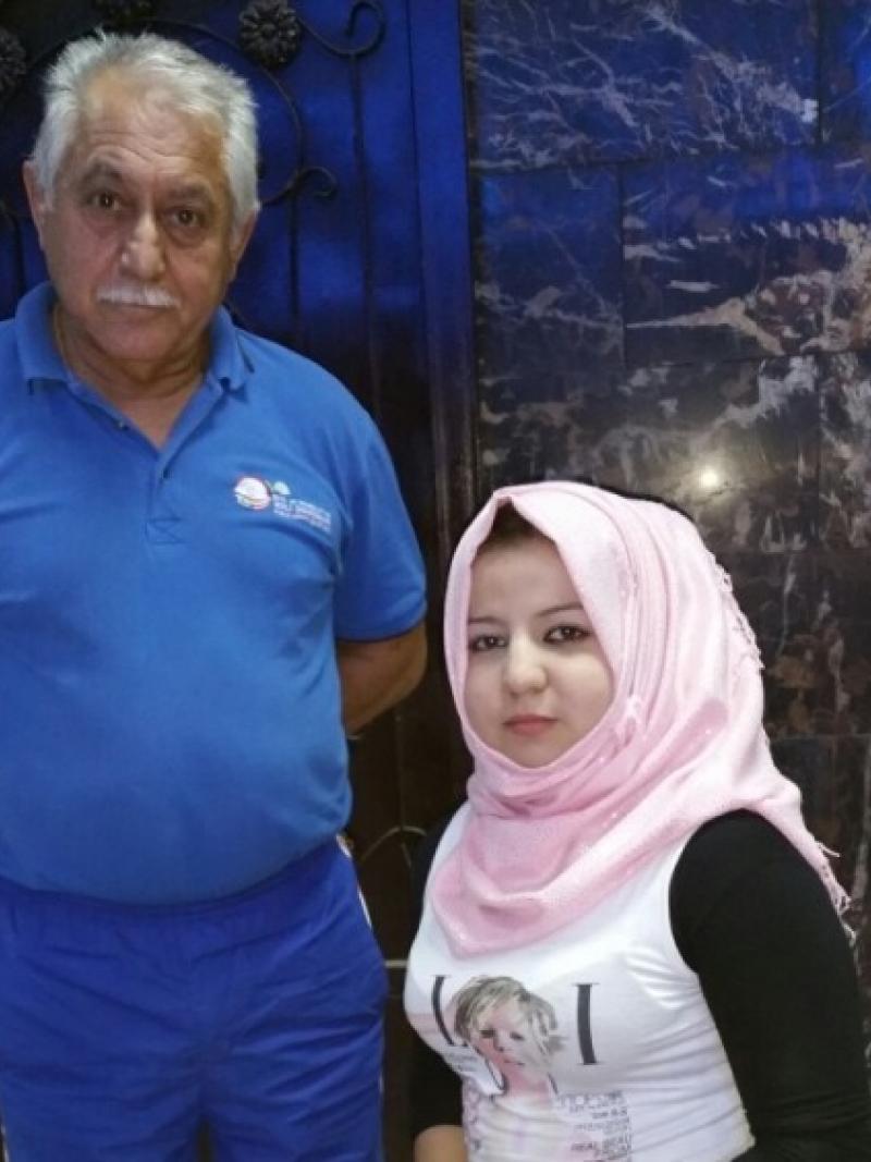 Zahraa Al-Maliki with her coach.