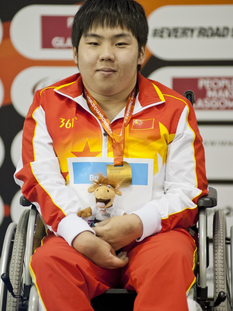 Man in wheelchair on the podium