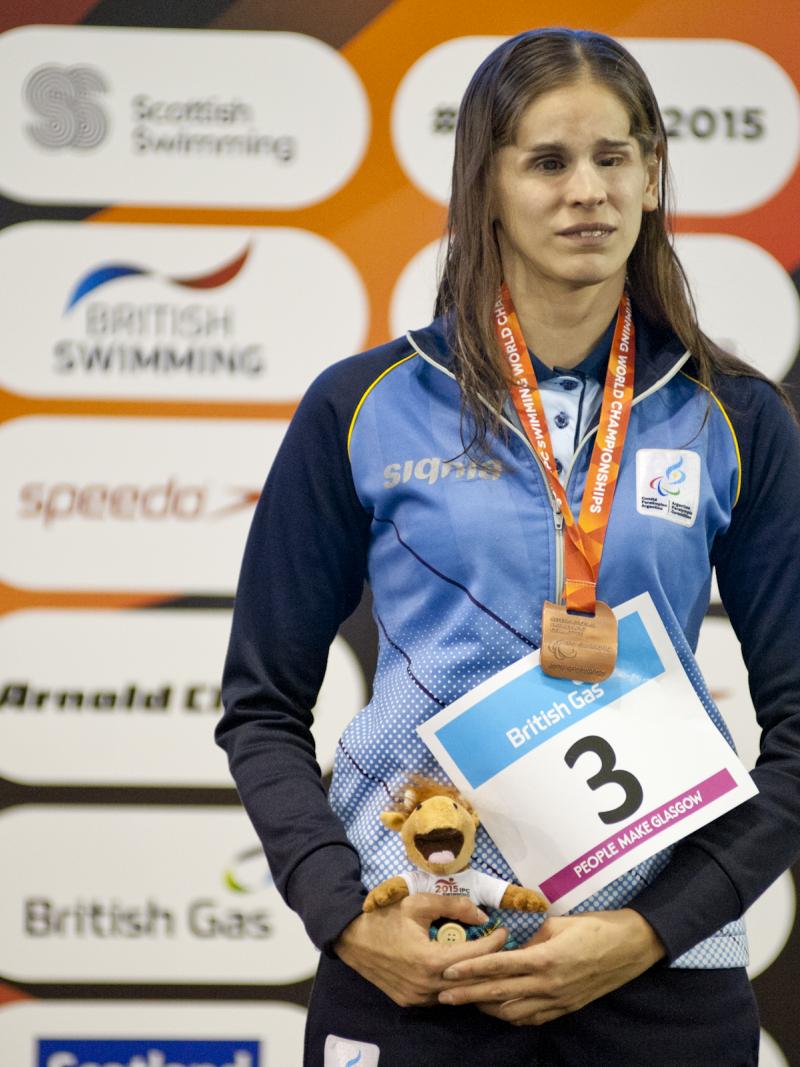 Nadia Baez of Argentina on the podium after the Women's 100m Breaststroke SB11 at the 2015 IPC Swimming World Championships in Glasgow