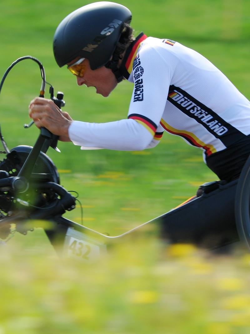Women on handbike cycling 