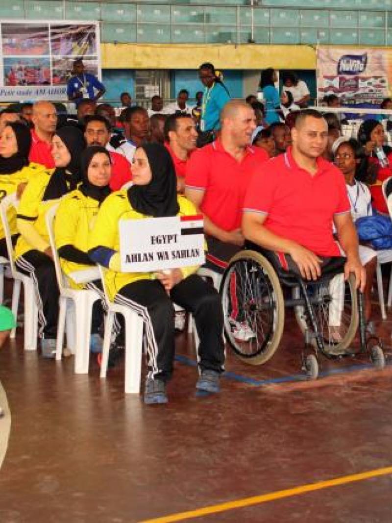 Athletes line up during a ceremony.
