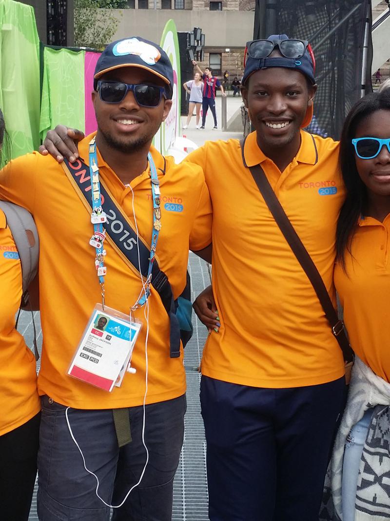 Toronto 2015 volunteers smile to the camera