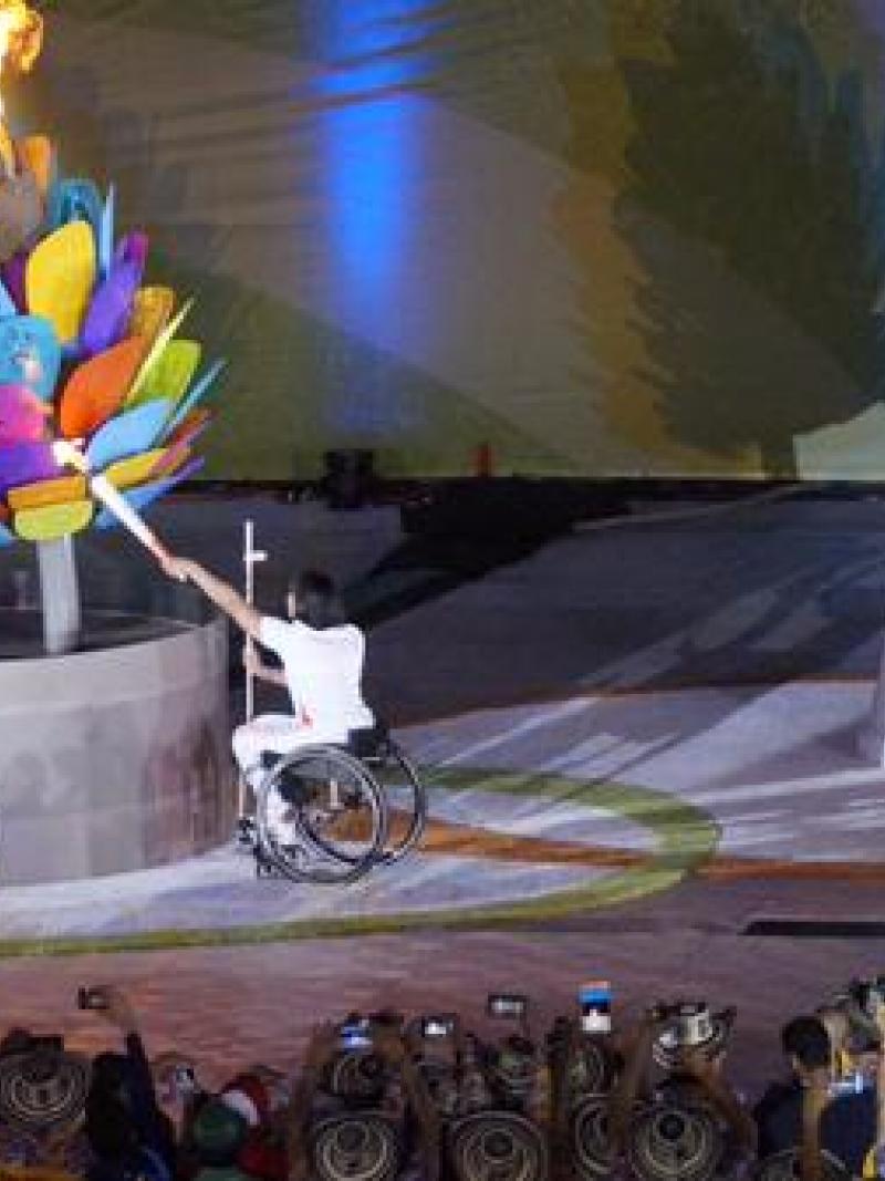 Canada's most successful ever athlete Chantal Petitclerc lights the Toronto 2015 Parapan Am cauldorn.