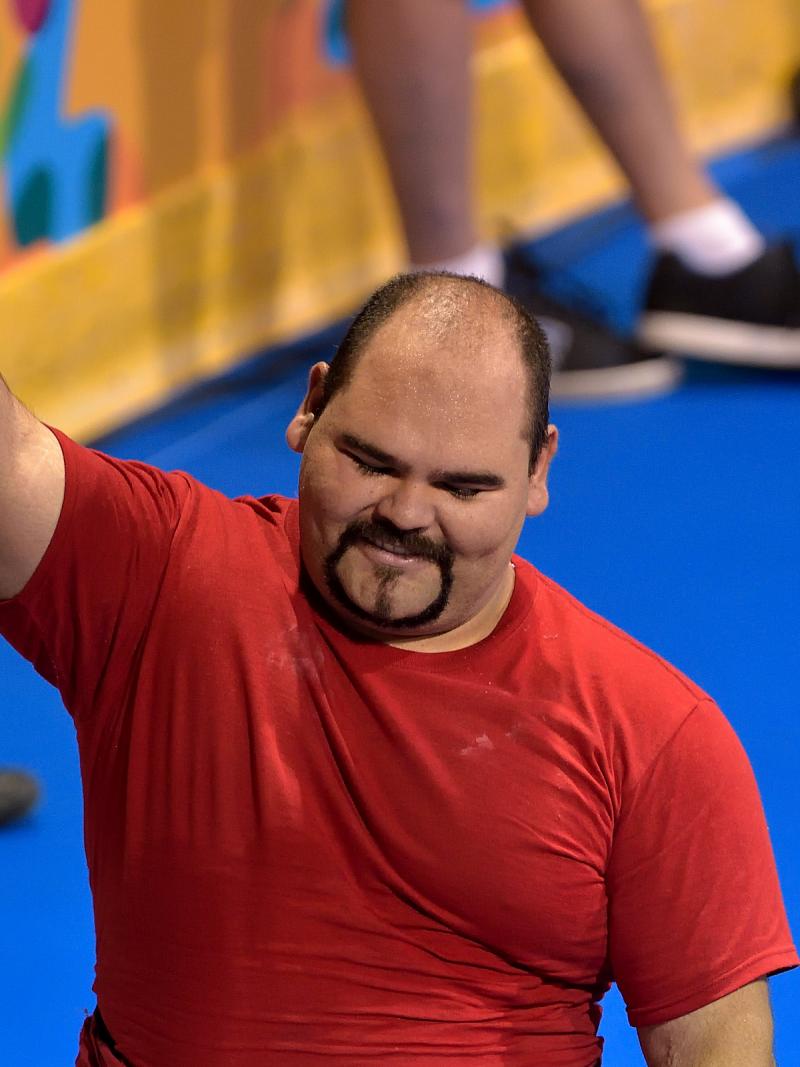 Jose Castillo Castillo gives a thumbs up to the audience after a competition 
