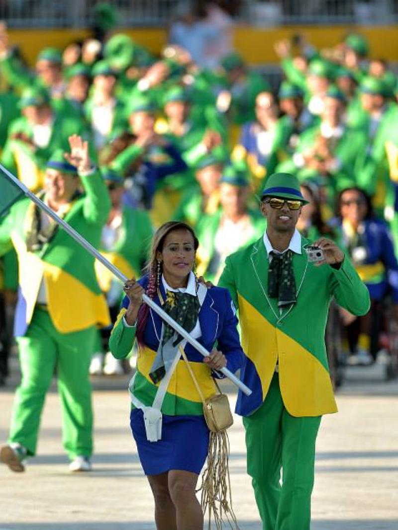 Brazilian sprinter Terezinha Guilhermina carrying the Brazilian flag during the Toronto 2015 Opening Ceremony