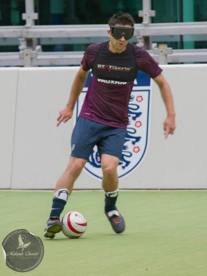 Player kicks ball.