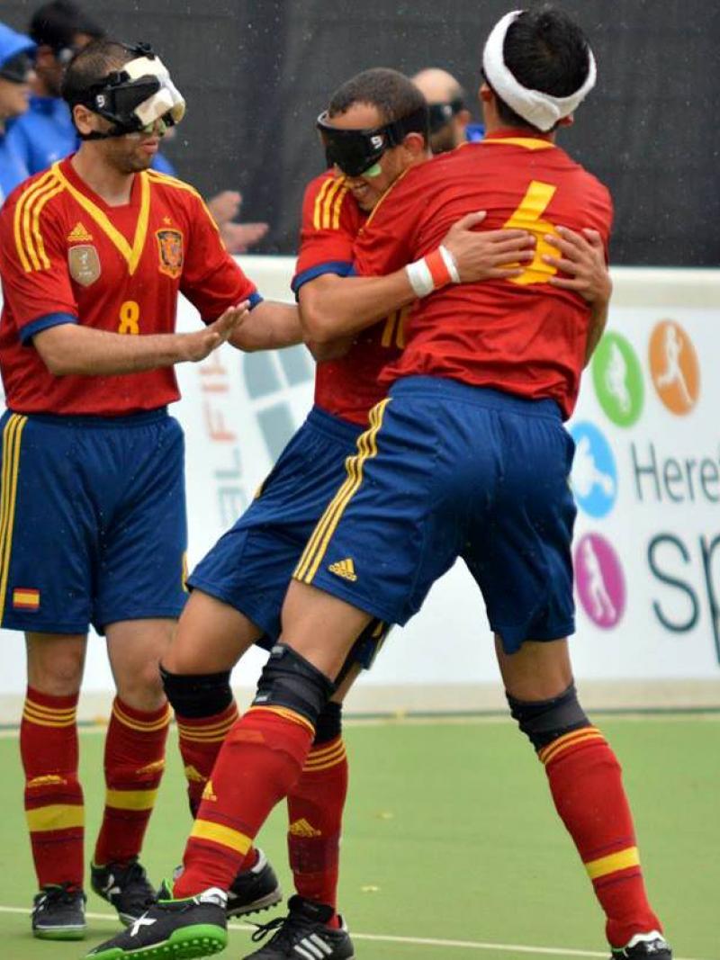 Spanish players celebrate a goal.