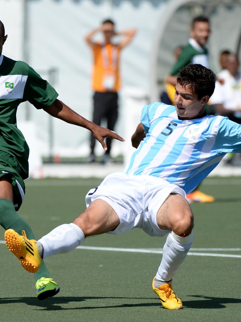 Two men playing football