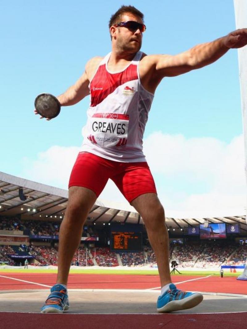Dan Greaves of England competes in the Men's F42/44 Discus final at Hampden Park Stadium at the Glasgow 2014 Commonwealth Games.