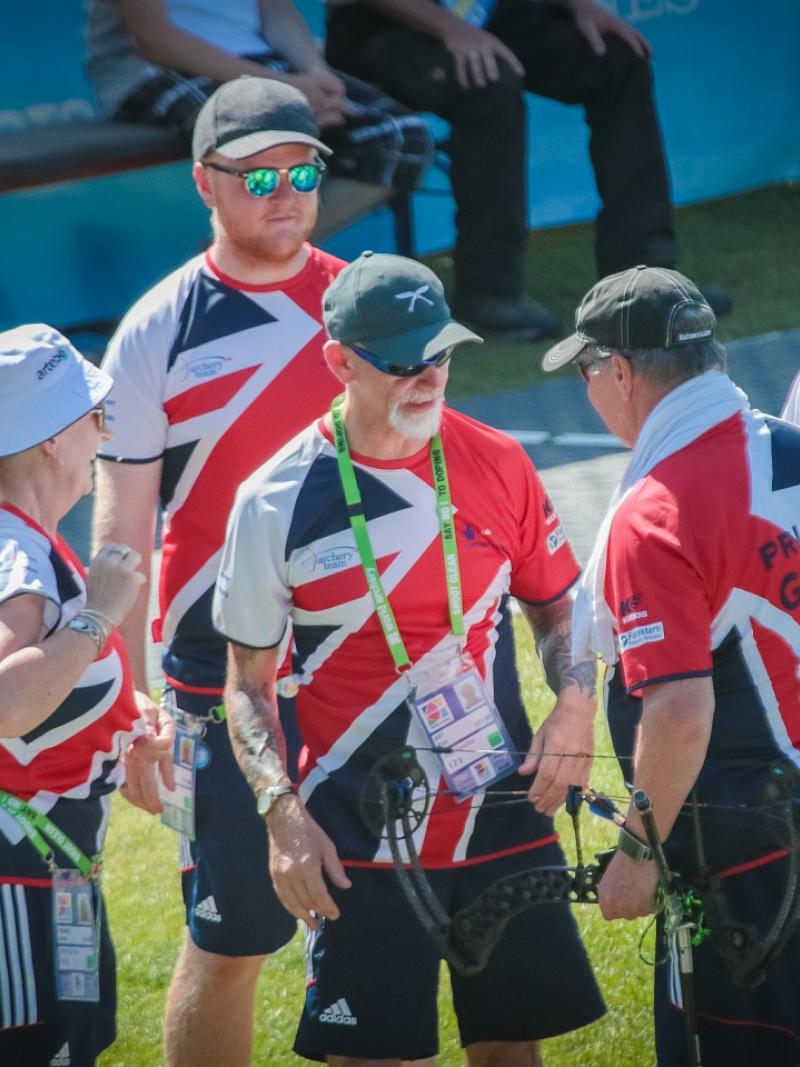 Group of archers huddled
