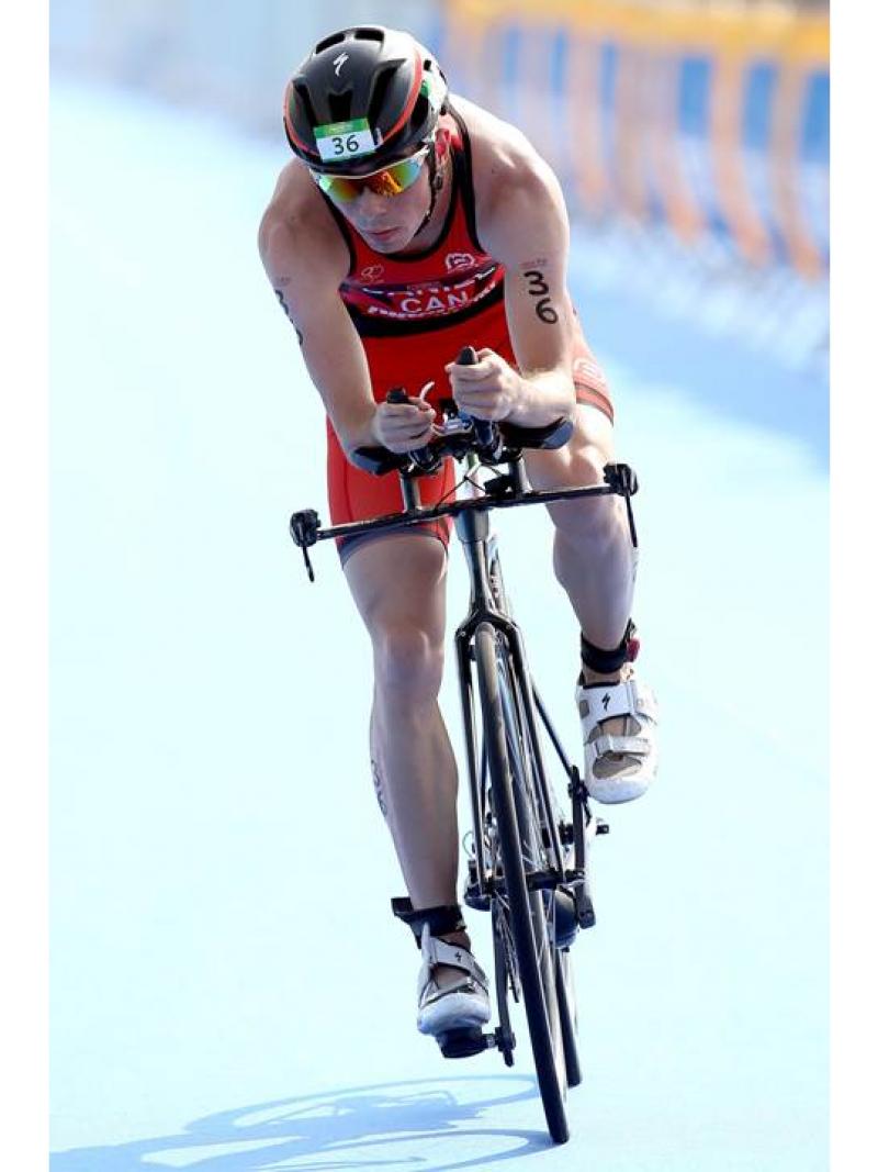 Stefan Daniel of Canada competes in the cycling portion of the men's PT4 class during the Aquece Rio Paratriathlon at Copacabana beach on August 1, 2015 in Rio de Janeiro, Brazil.