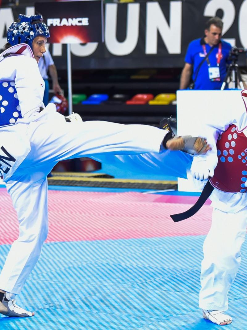 Two athletes doing taekwondo