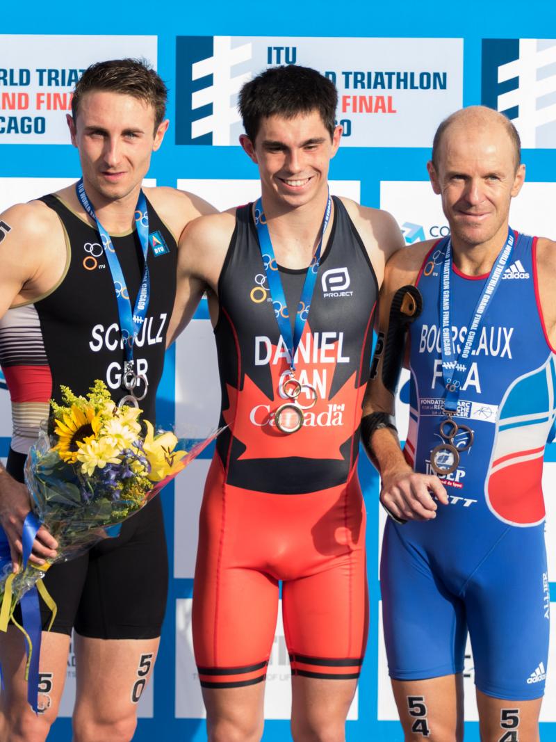 Podium with three men