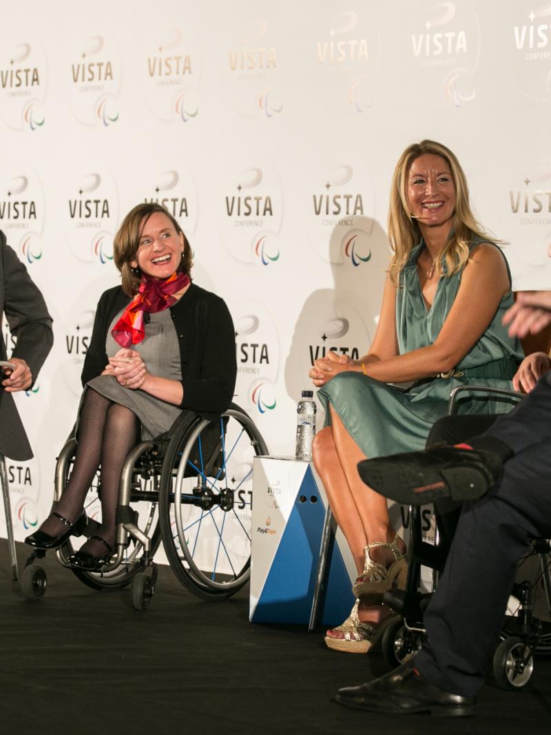 Three women and two men sitting on the podium during a podium discussion at Vista 2015.