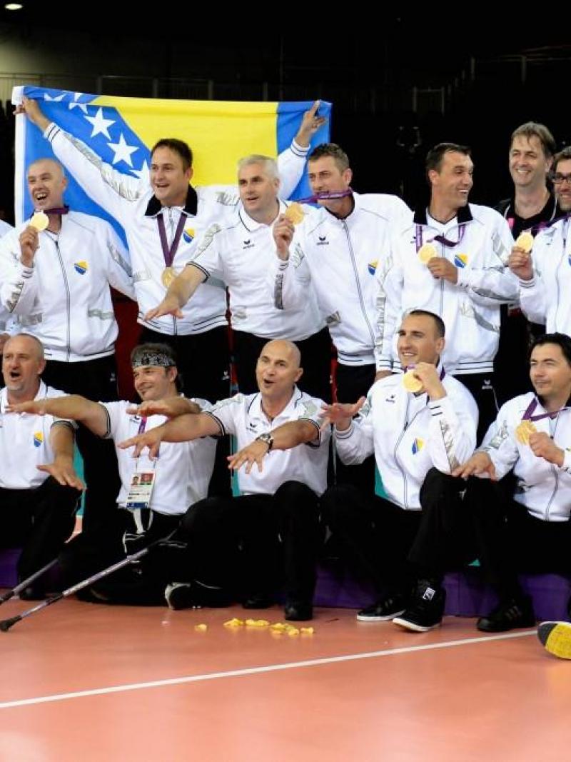 The team of Bosnia and Herzegovina celebrates after winning the gold in the Men's Sitting Volleyball competition at the London 2012 Paralympic Games.