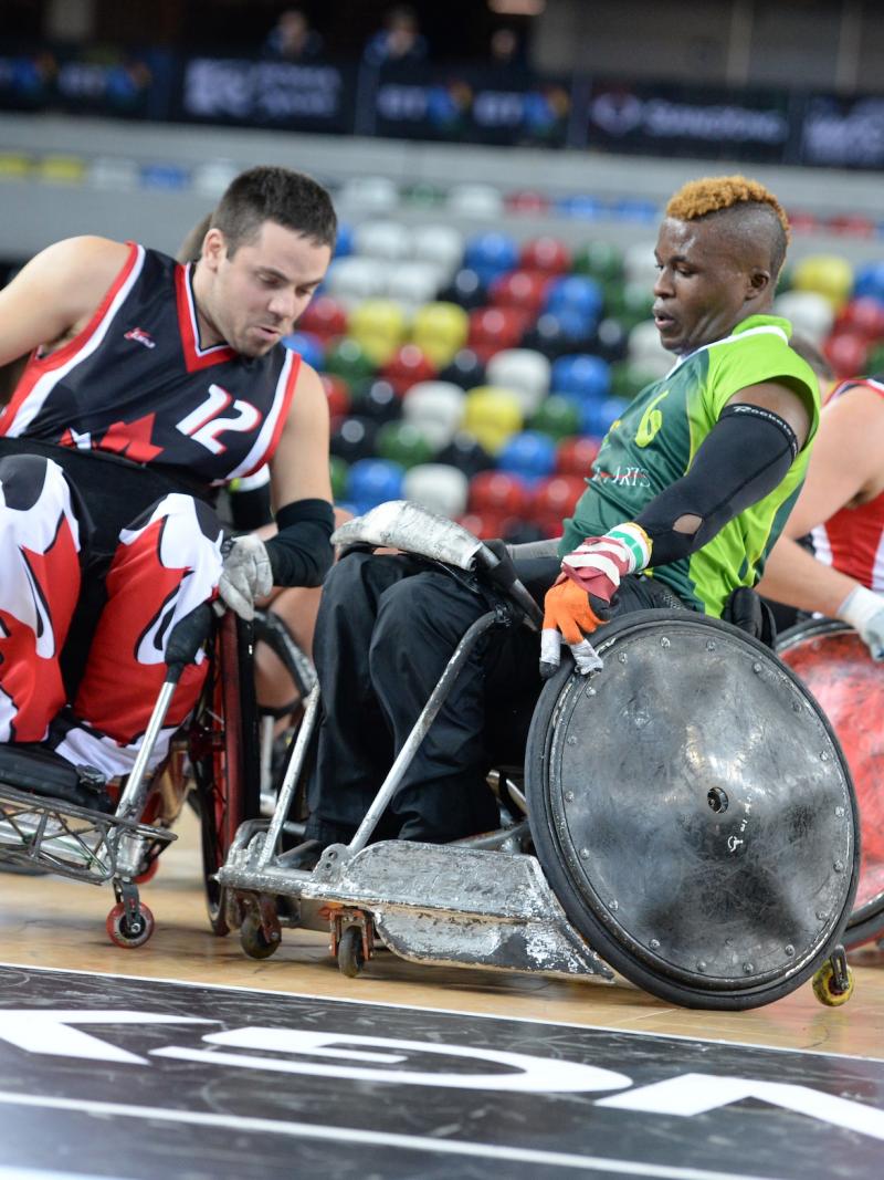 Wheelchair rugby players in action