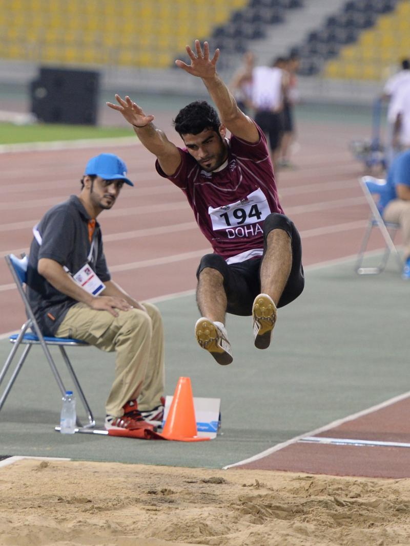 Man doing long jump