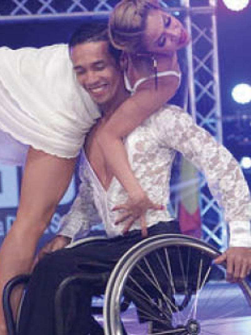 Graphic with wheelchair dance couple dancing