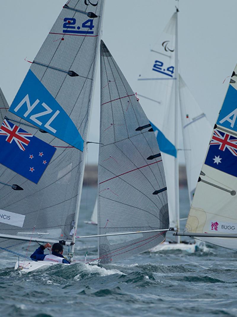 Three sailing boats on the water
