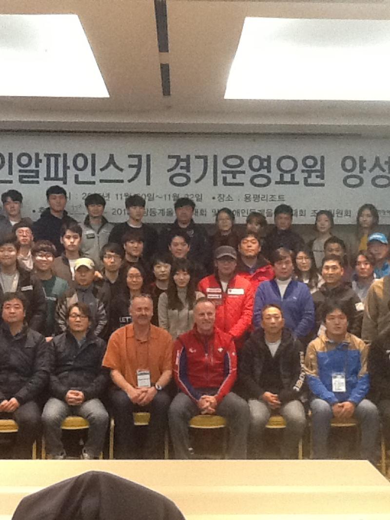 Group shot of around 30 people