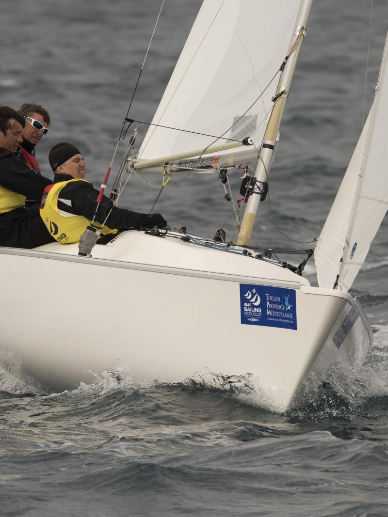 Three men sailing