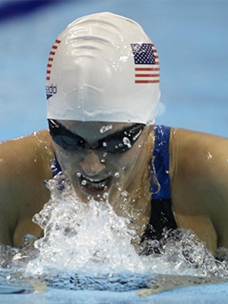 A female swimmer doing breaststroke