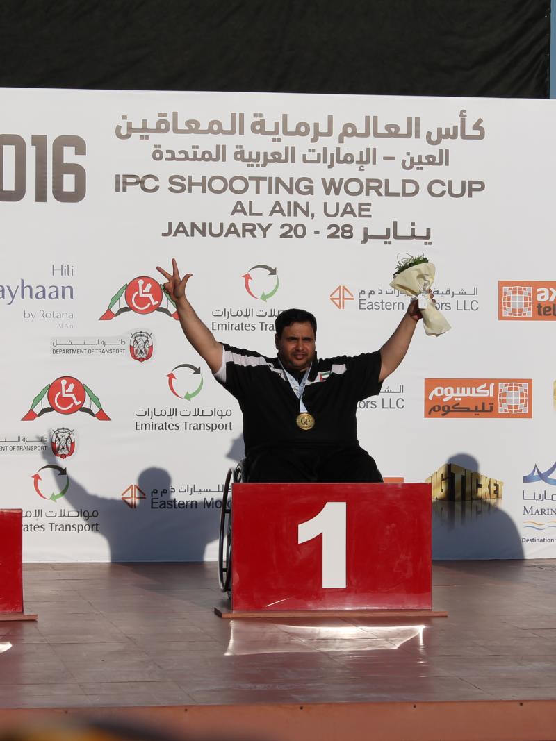 Three para-sport shooters celebrate their medals