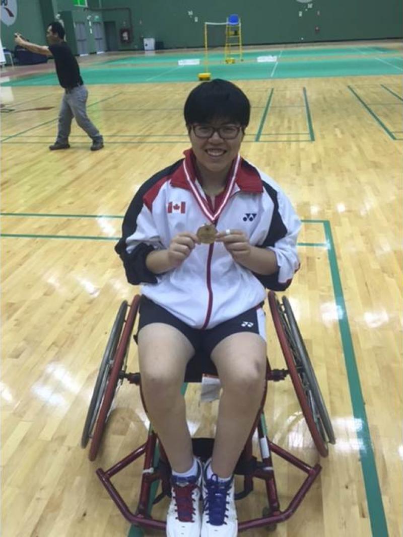athlete with a silver medal