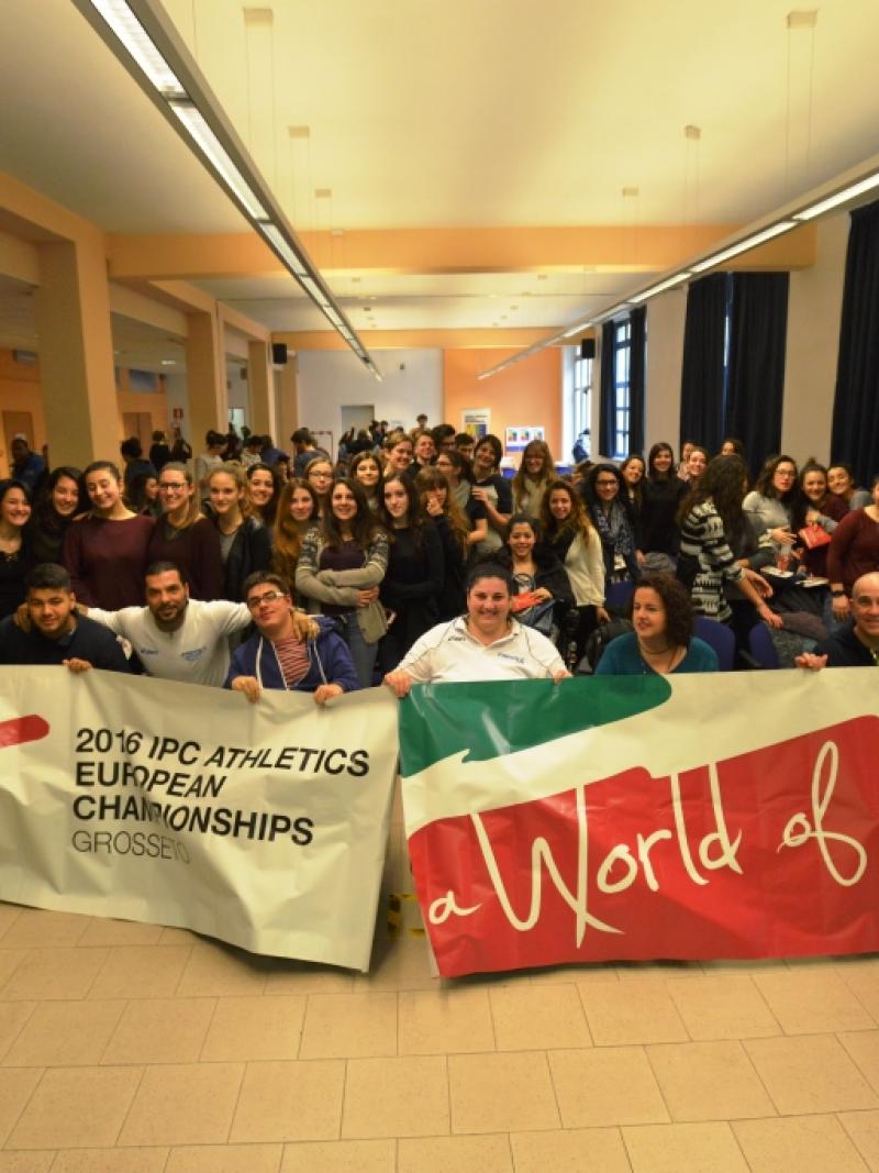 Group picture with group showing Grosseto 2016 banners