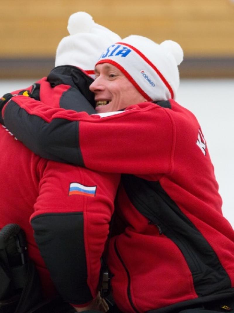 A Russian wheelchair curler celebrates progressing to the gold medal game