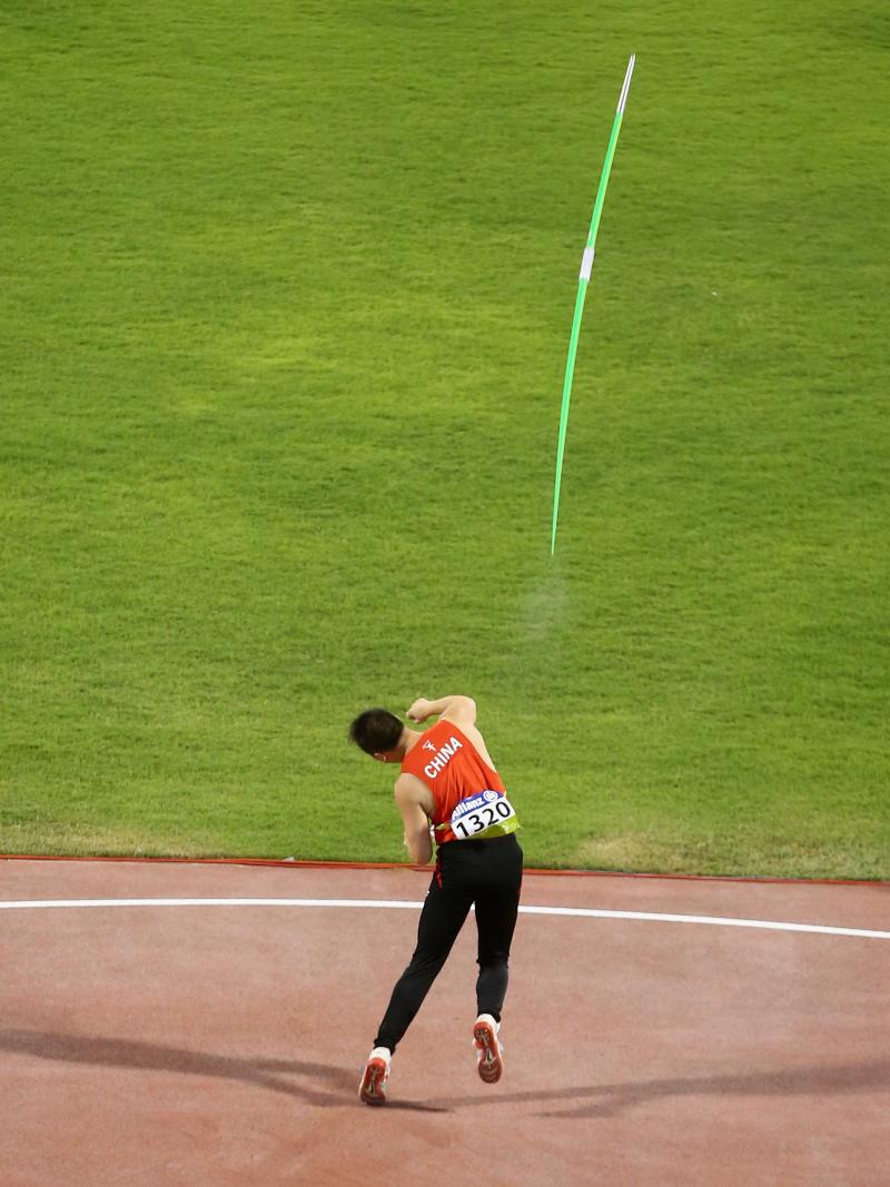 A para-athlete throws a javelin